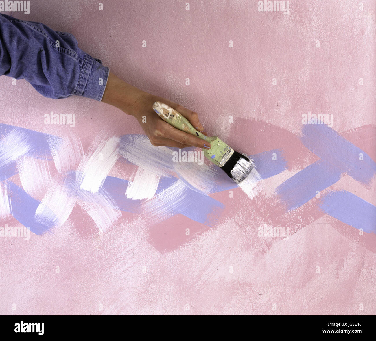 Step x step decorating: Handcreating paint effect on wall Stock Photo