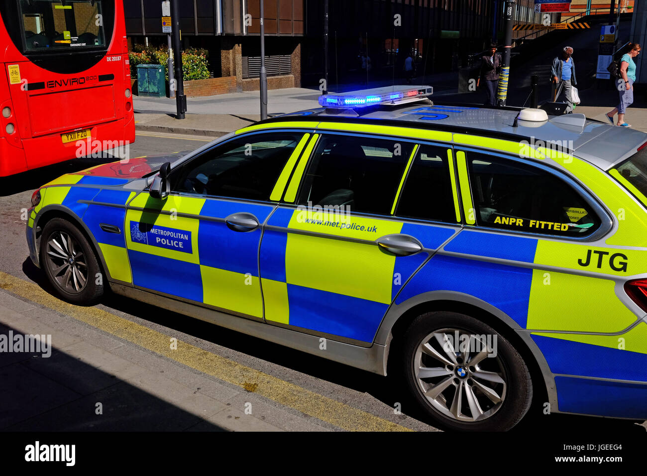 Metropolitan Police responding to a real crime incident at Harrow Bus Station Stock Photo