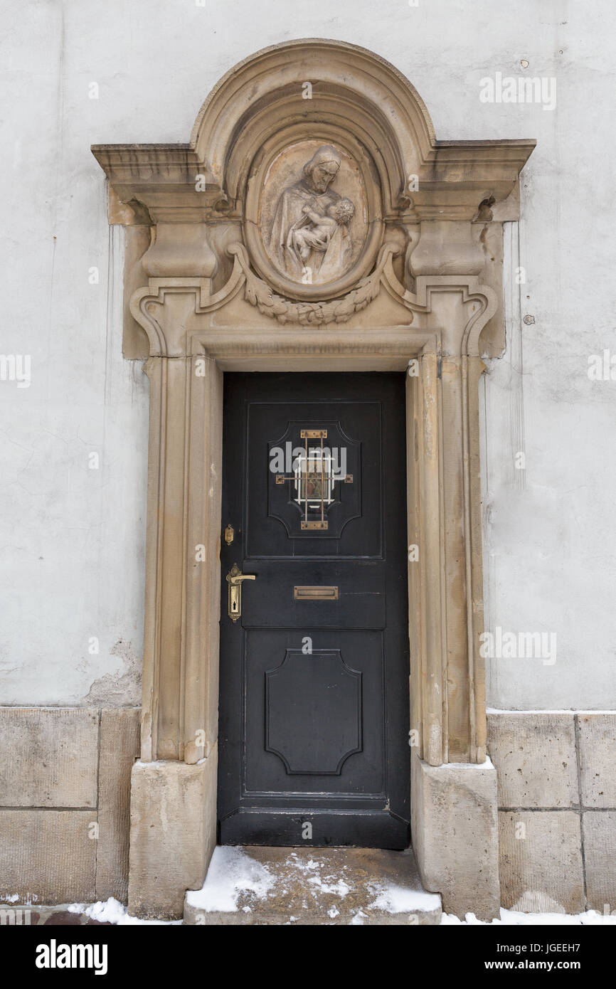 Ancient door of St Mary Church presbytery in the old town of Krakow, Poland. Stock Photo