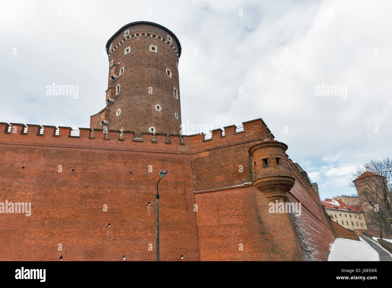 Wawel Royal castle Sandomierska tower and Senator tower with Polish flag in Krakow, Poland. Stock Photo