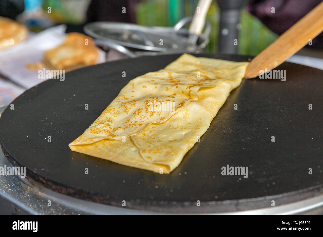 Making pancake with filling on frying electric stove outdoor closeup Stock Photo Alamy