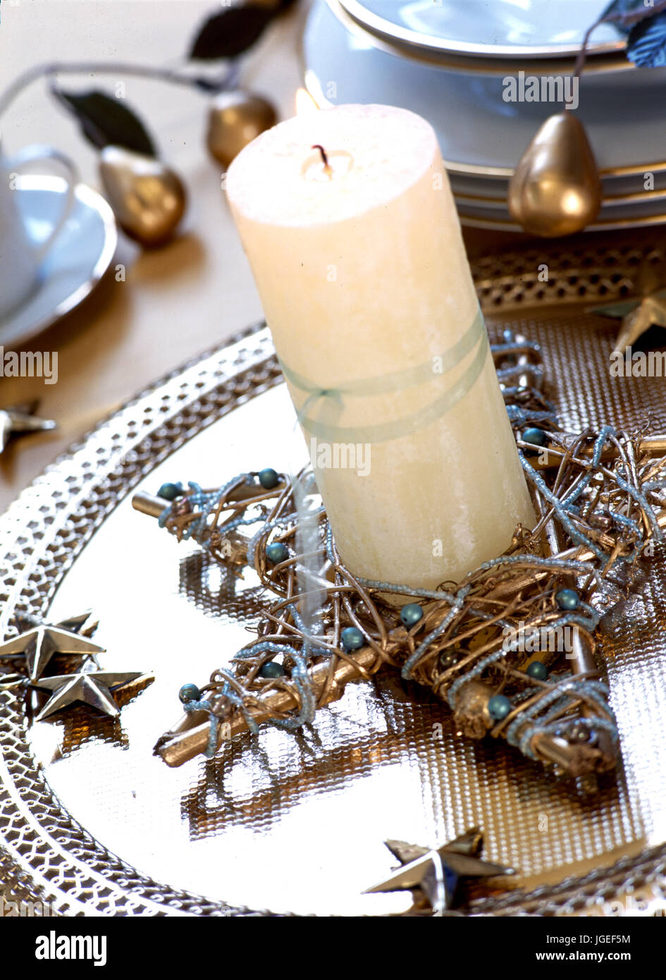 Candle as diningroom table centrepiece Stock Photo Alamy