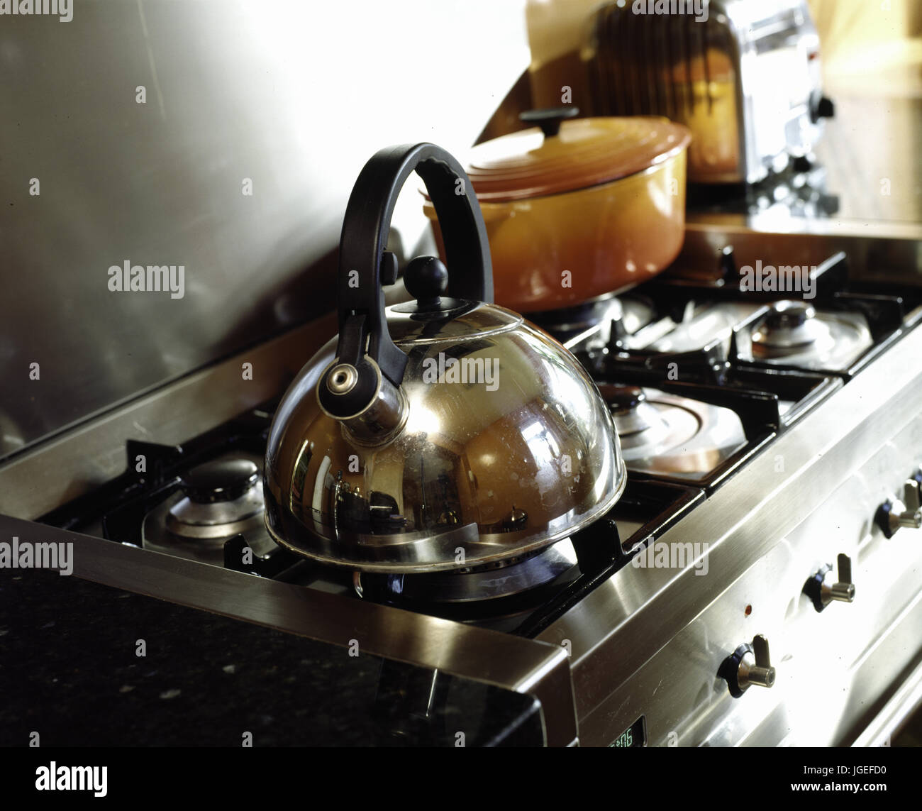 Closeup of kettle on gas hob Stock Photo