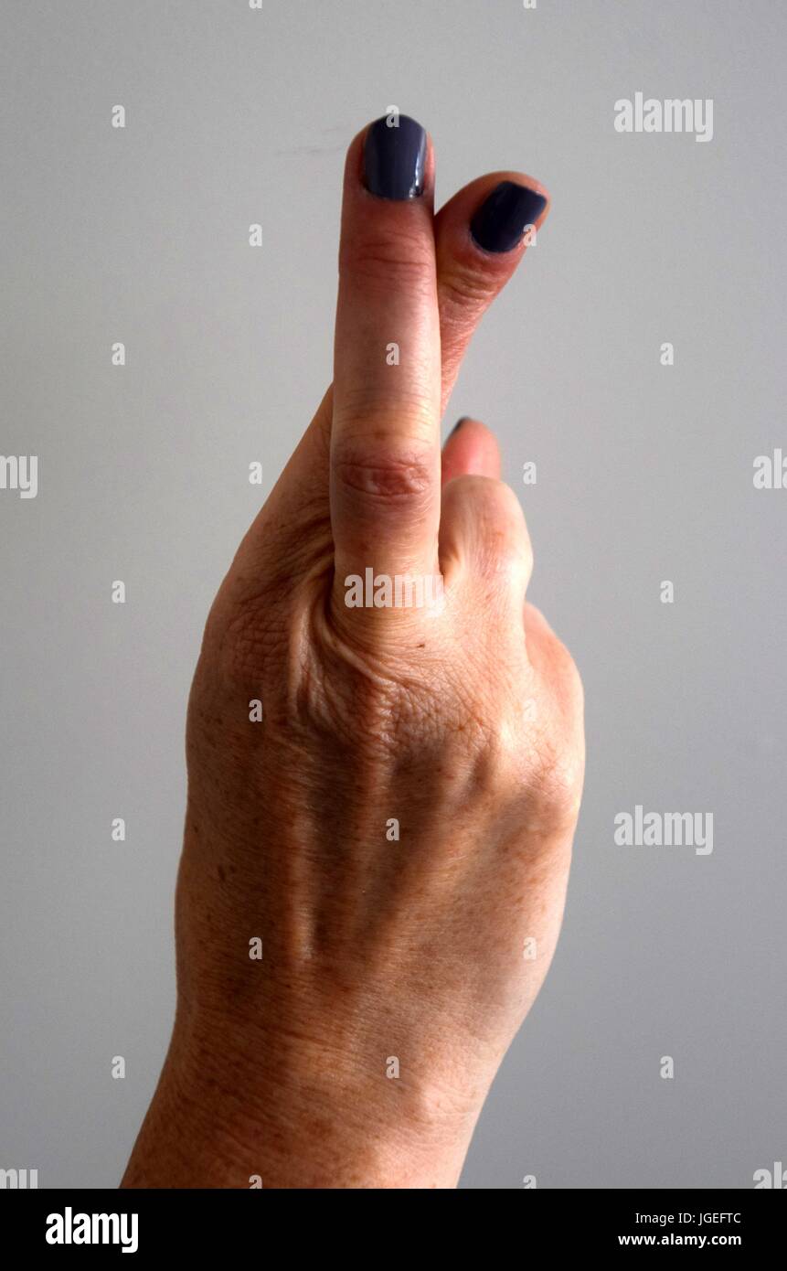 fingers make signs, Handzeichen, glasses in the Hand, Brille in der Hand Stock Photo