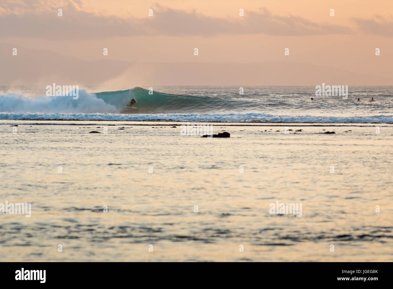 7th June 2017; Desert Point, Lombok, Indonesia.; Surfers from around the world enjoy the extreme swell of tube waves at this remote world class surf s Stock Photo