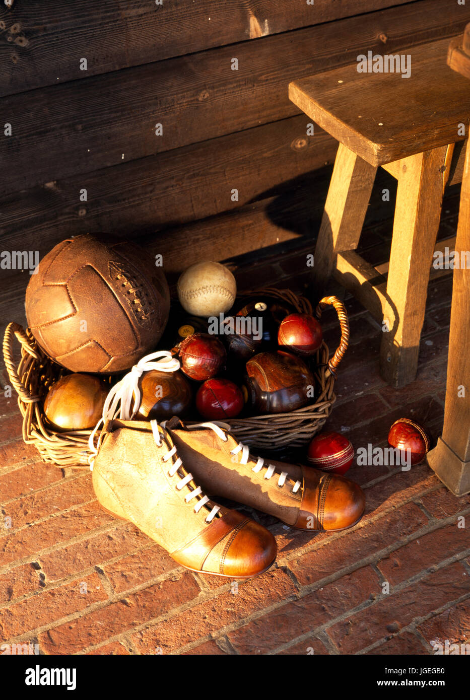 Retro football kit and cricket balls Stock Photo
