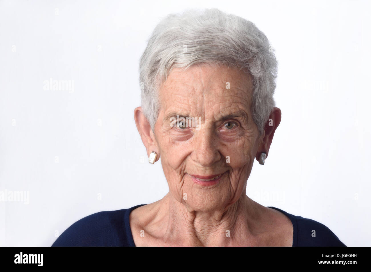 portrait of a senior woman on white background Stock Photo - Alamy