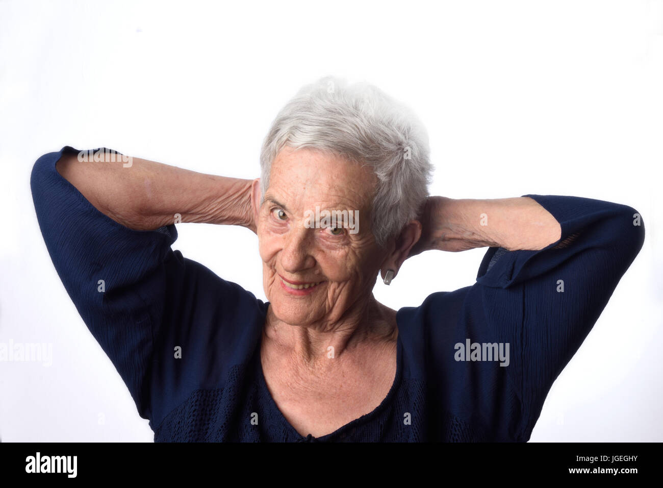 portrait of a senior woman on white background Stock Photo - Alamy