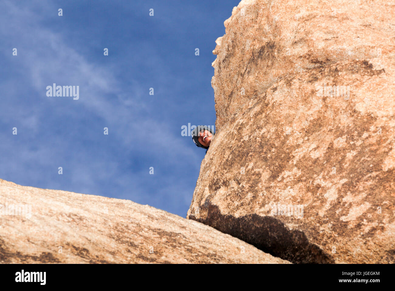 South Asian woman rock climbing in the desert Stock Photo - Alamy