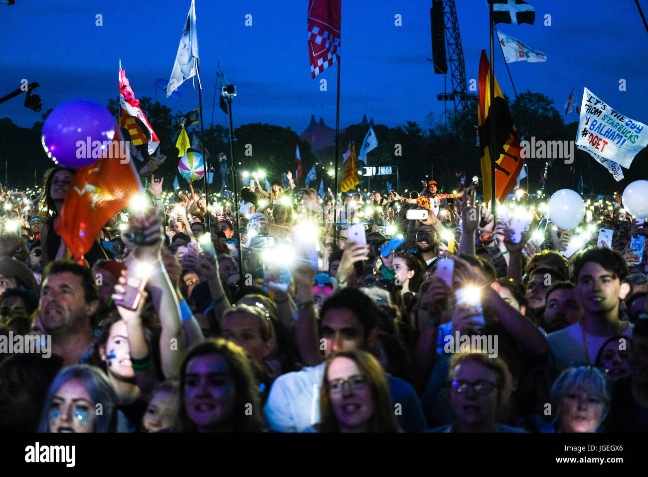 Ed Sheeran at Glastonbury Festival on Sunday 25 June 2017 held at Worthy Farm, Pilton. Pictured: Fans dance and light up the arena as Ed plays . Stock Photo