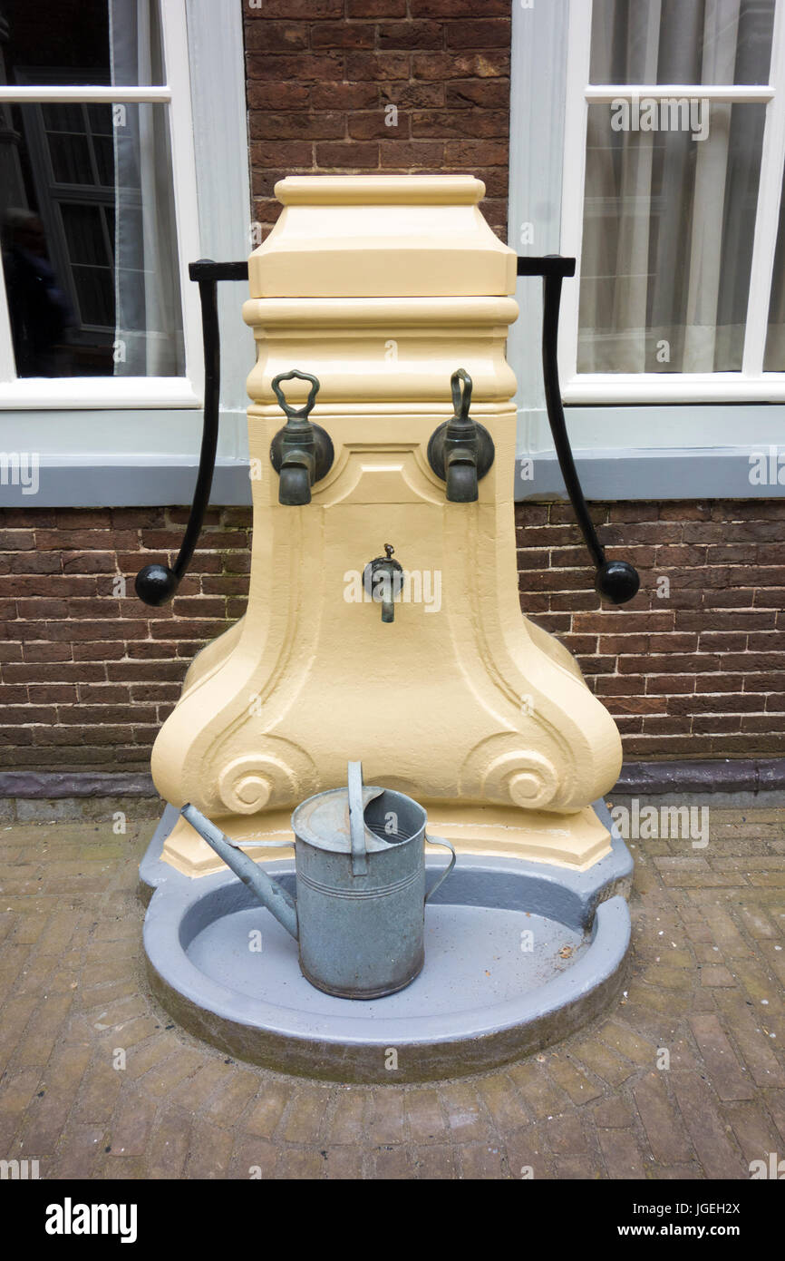 court yard, water pump, old Stock Photo Alamy