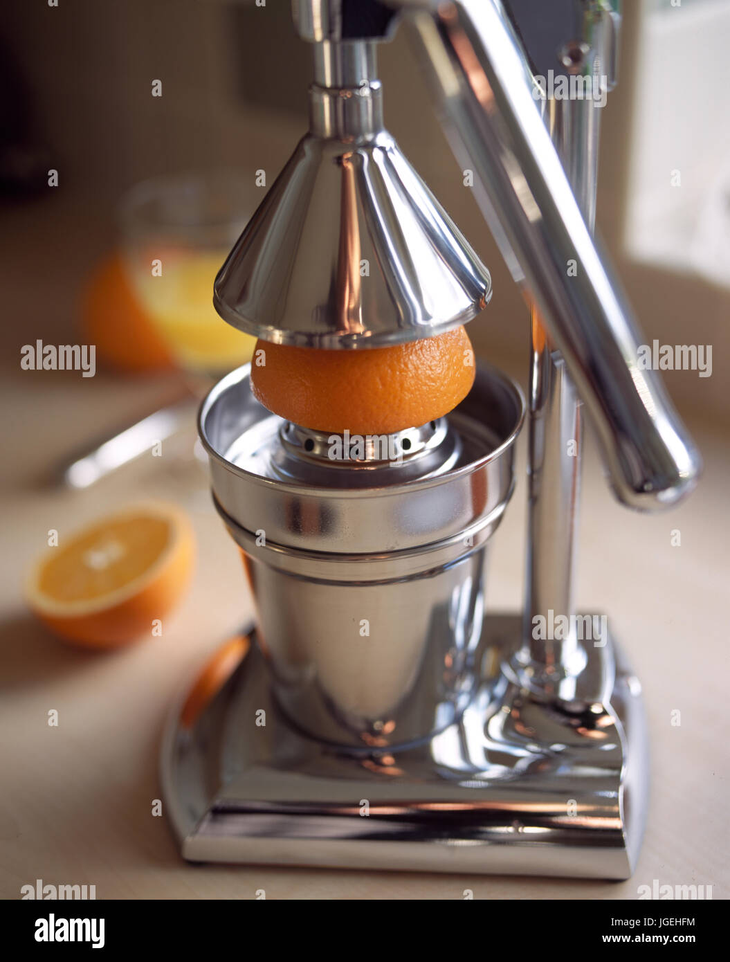 Squeezing oranges for breakfast Stock Photo Alamy