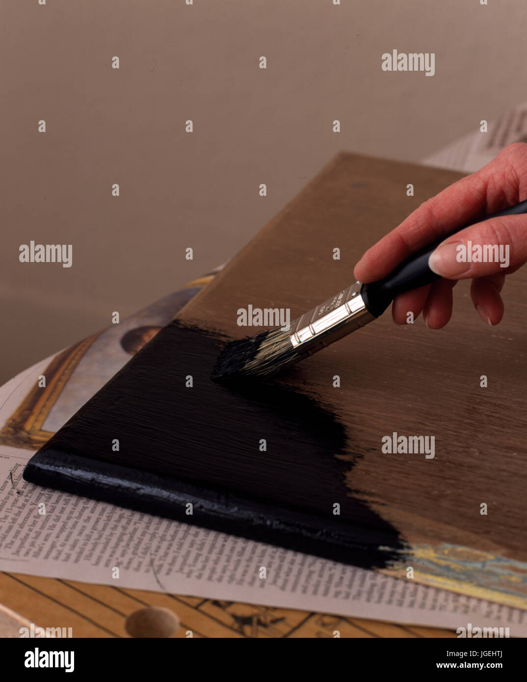 Painting wooden worktop:  Step x step shots of craft and diy projects Stock Photo