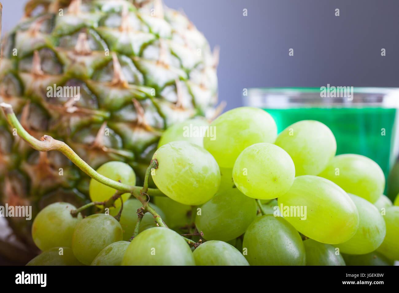 Close up of white grapes and pineapple Stock Photo Alamy