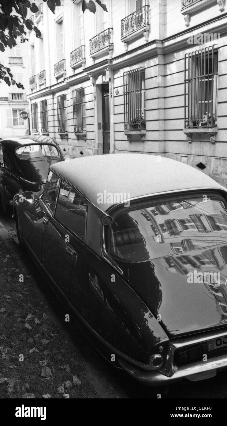 DS CITROEN AND PEUGEOT 203 IN THE STREET - VERSAILLES FRANCE - FRENCH RETRO - FRENCH VINTAGE - SILVER FILM © Frédéric.BEAUMONT Stock Photo