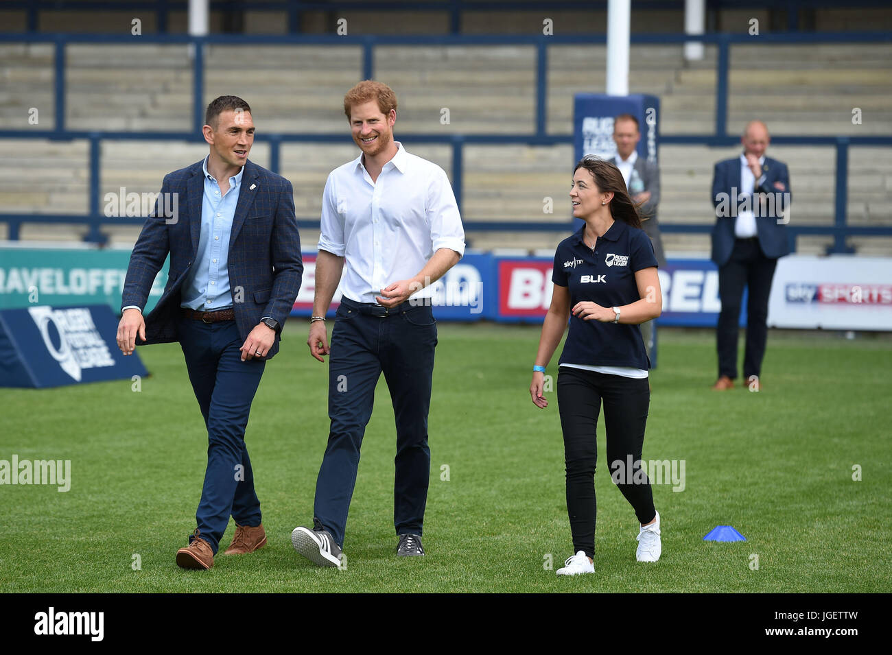 Prince Harry walks with former Leeds Rhino rugby league player, Kevin ...