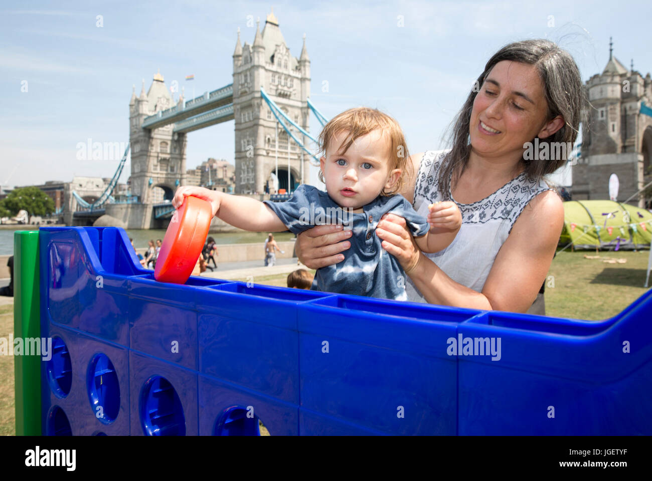 People attend the launch of the Caravan and Motorhome Club&acirc;€™s Big Little Tent Festival at Potters Field, London, an initiative to get families to enjoy the great outdoors. Stock Photo
