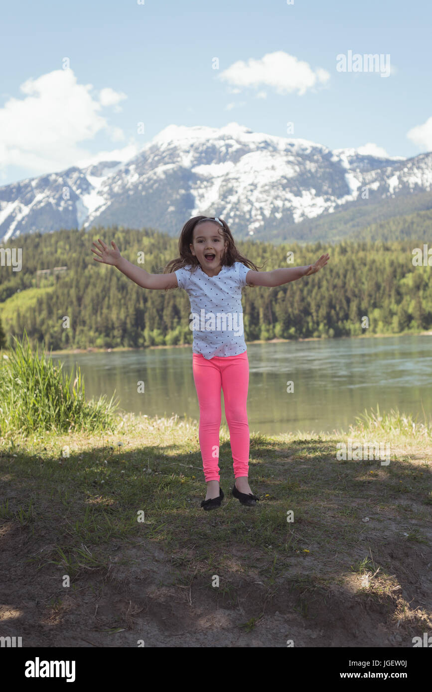 Girl jumping in river hi-res stock photography and images - Alamy