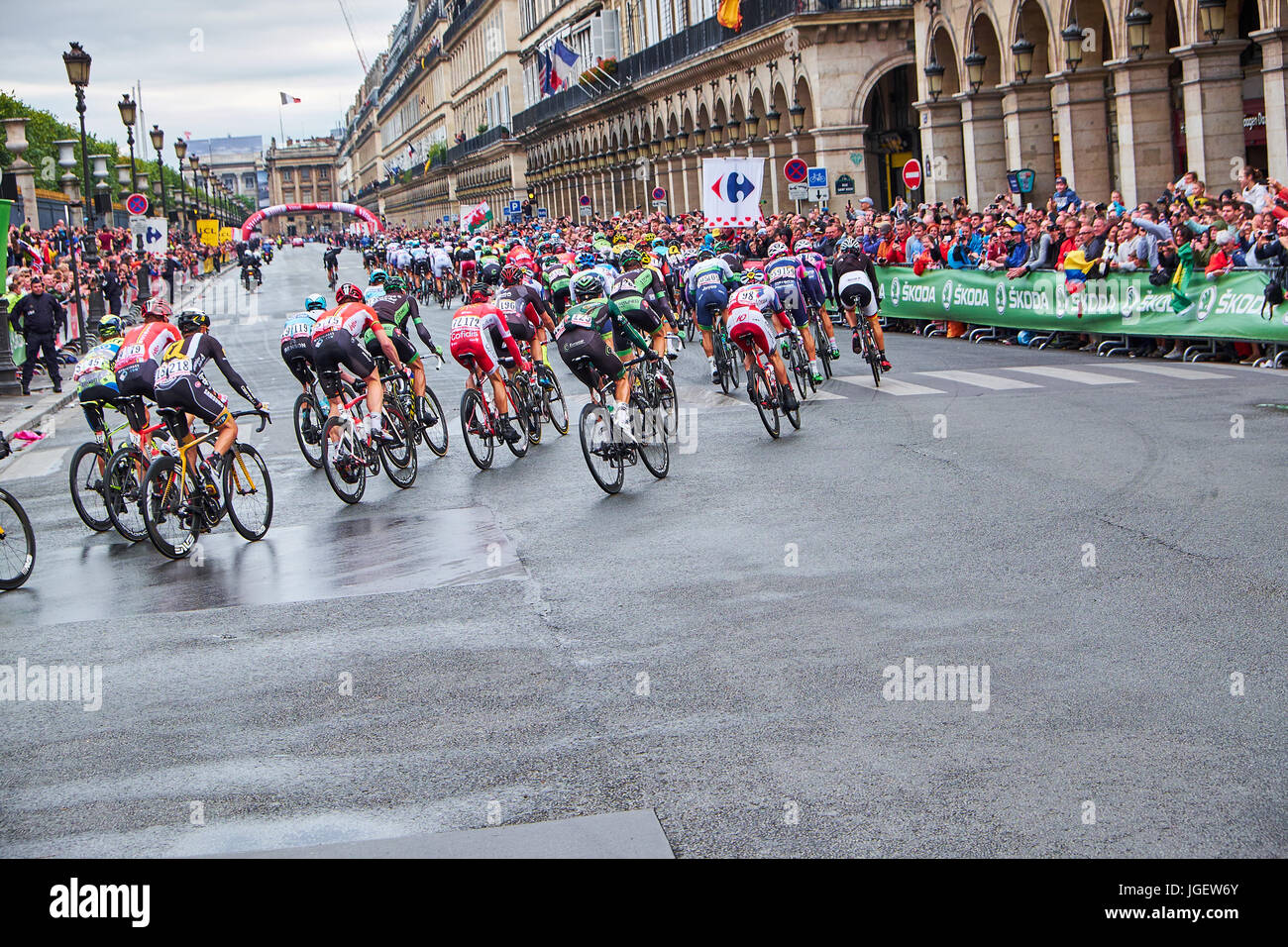 PARIS, FRANCE - JULY 26, 2015: the Tour de France peloton has arrived in Paris, where the riders has to round the Champs Elysees ten times Stock Photo
