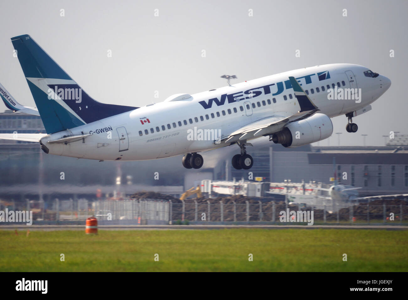 Montreal,Canada,6 July,2017.Westjet flight taking-off from Trudeau International airport.Credit:Mario Beauregard/Alamy Live News Stock Photo