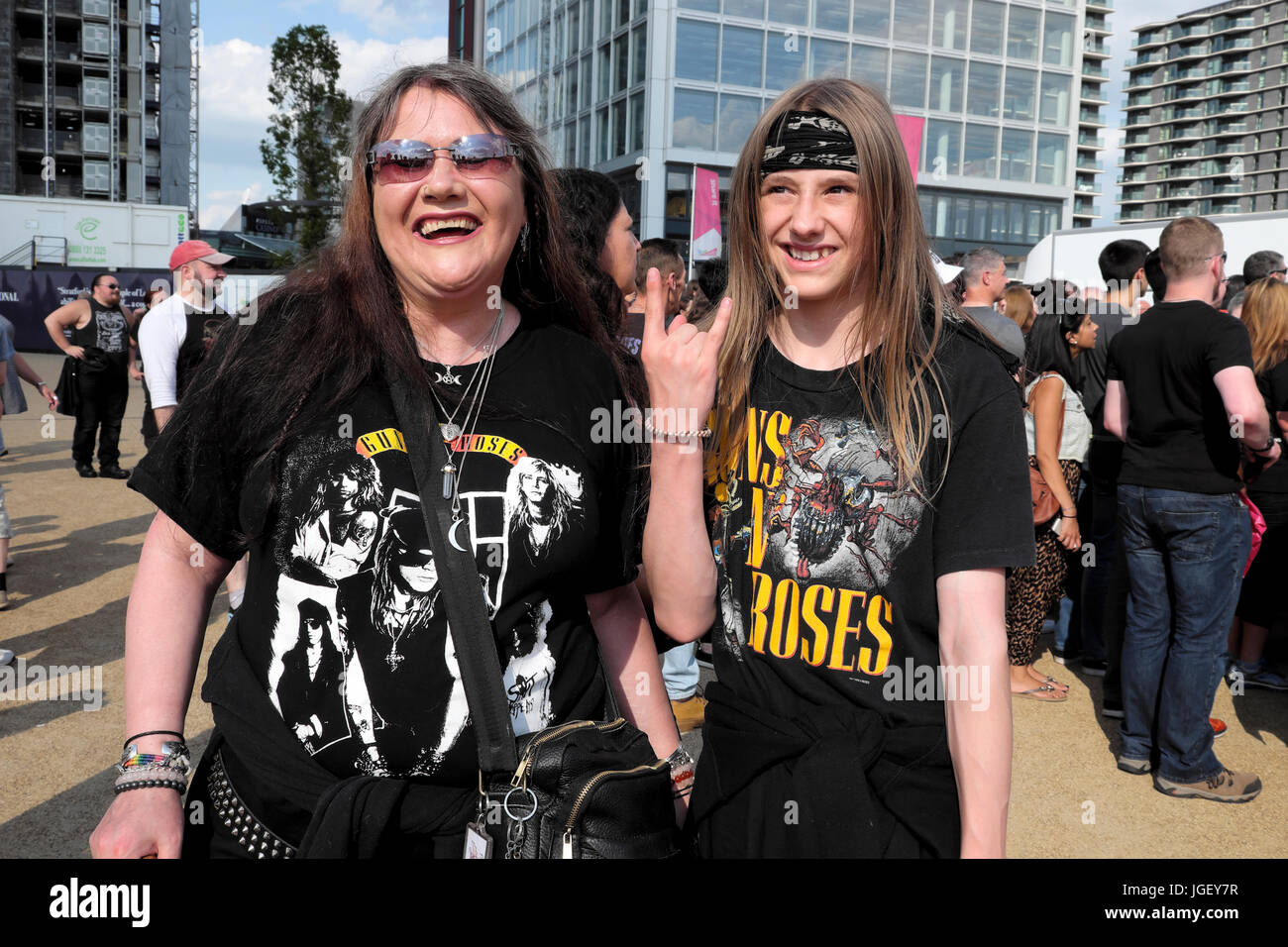 Guns N' Roses 2017 concert mother son wearing GnR t shirts pose at Queen Elizabeth Olympic Park stadium Stratford East London England UK  KATHY DEWITT Stock Photo