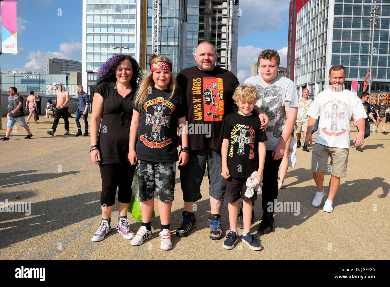 Guns N' Roses 2017 concert families wearing GnR t pose at Elizabeth Olympic Park stadium Stratford East London UK KATHY DEWITT Stock Photo - Alamy