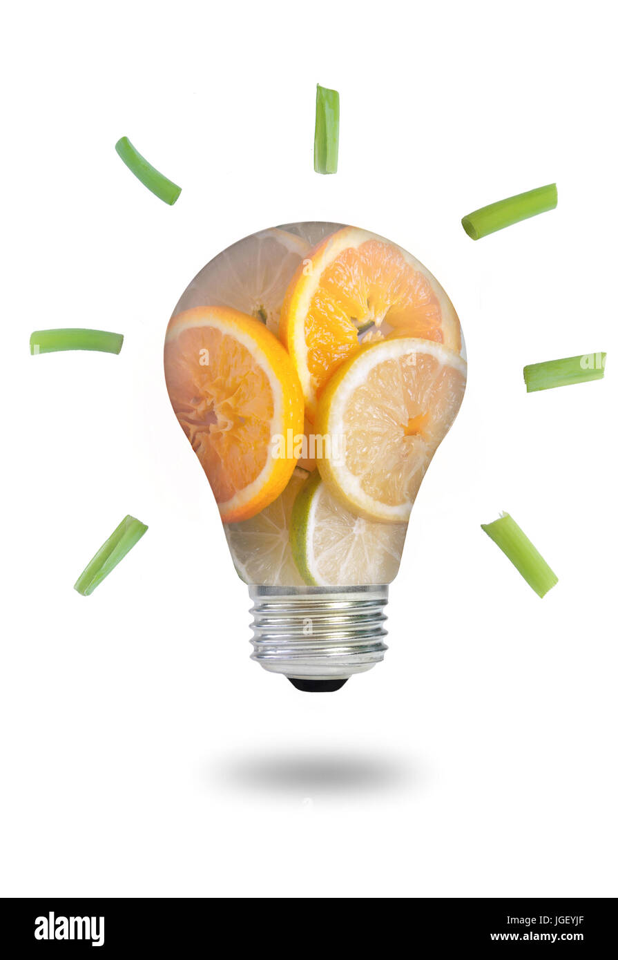Light bulb made of fruits and vegetables over a white background Stock Photo