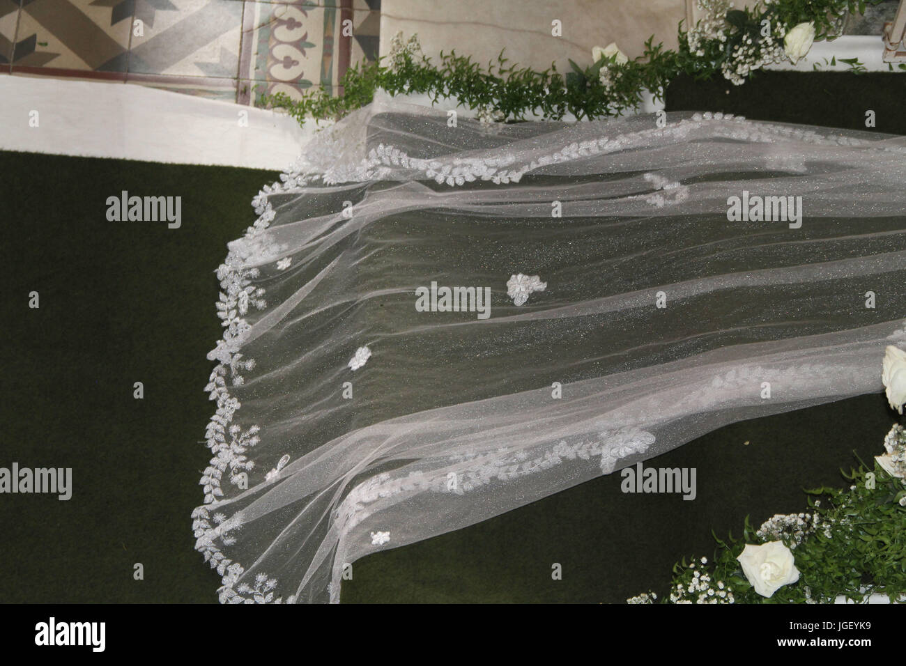 Detail, veil, bride, carpet, Church, 2016, Merces, Minas Gerais, Brazil. Stock Photo