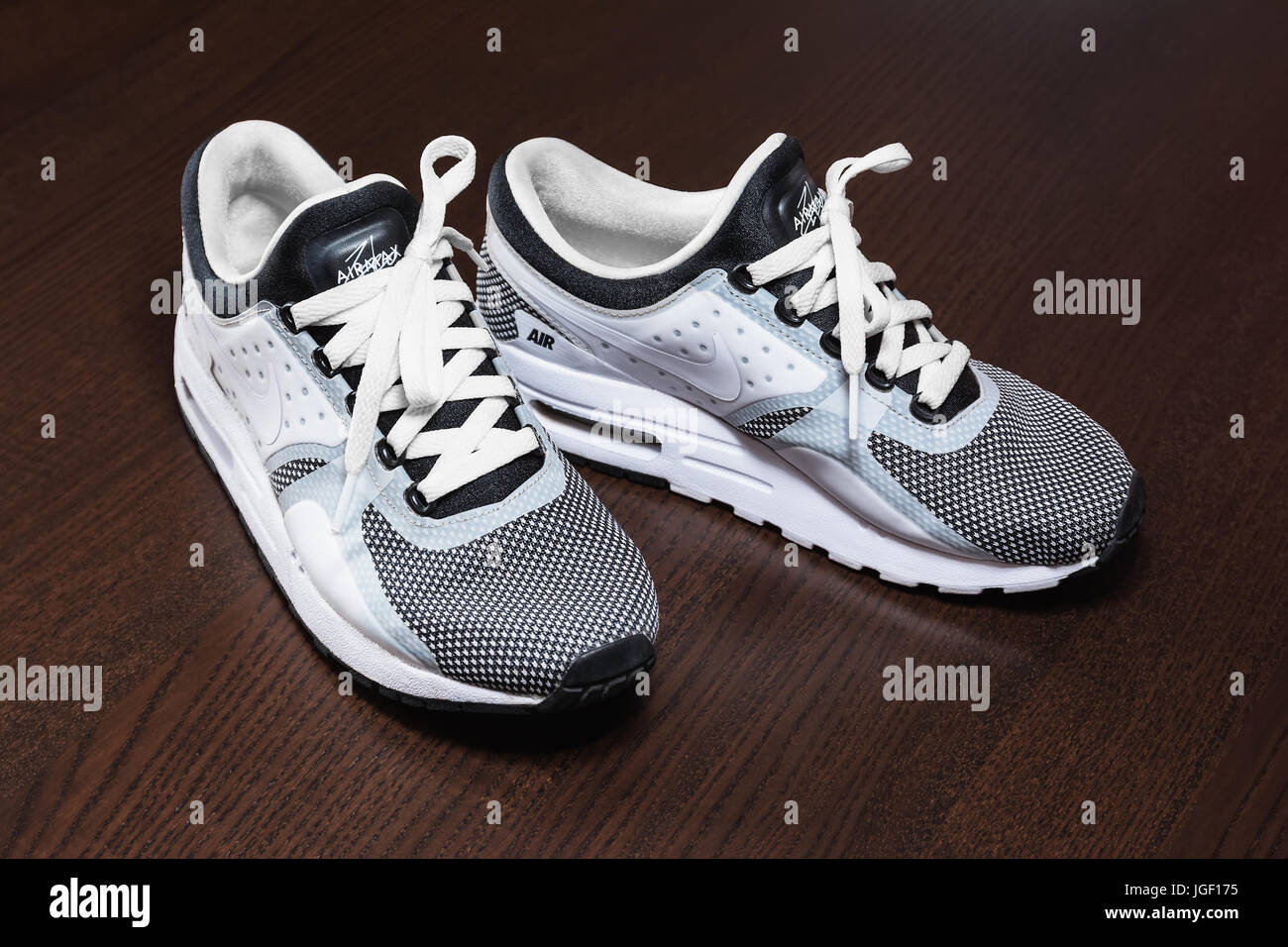 SOFIA, BULGARIA - JULY 1, 2017: Nike Air MAX Zero Essential shoes -  sneakers - trainers in black and white on wooden background. Nike is a  global spor Stock Photo - Alamy