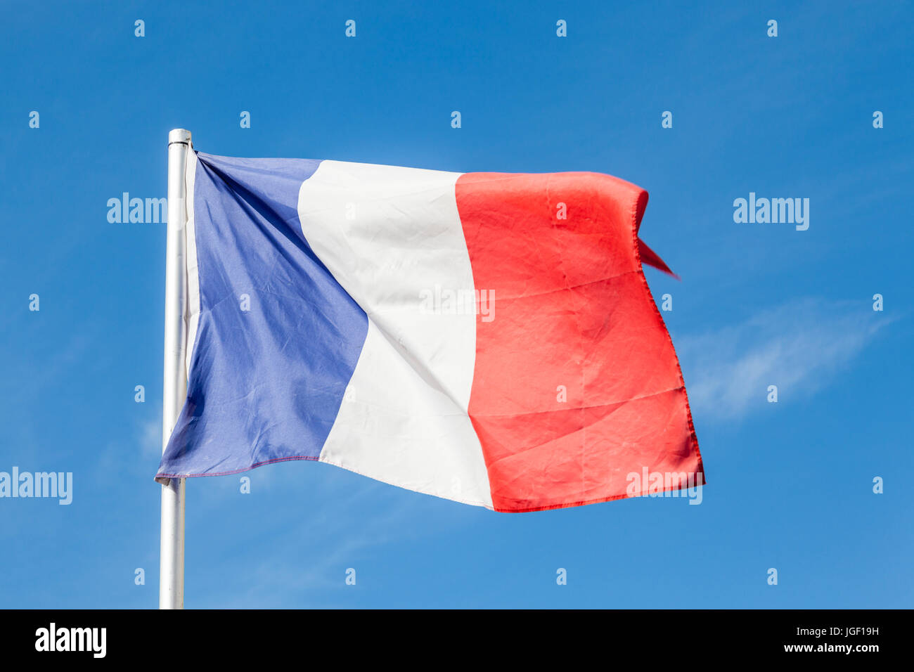 French flag blowing in the wind Stock Photo