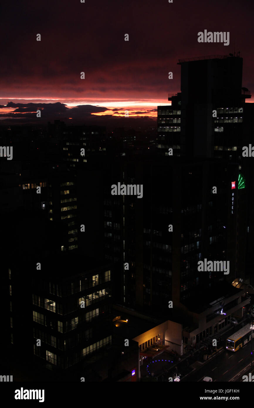 night, red sky, dark clouds, 2012, Capital, Avenue Paulista, São Paulo, Brazil. Stock Photo