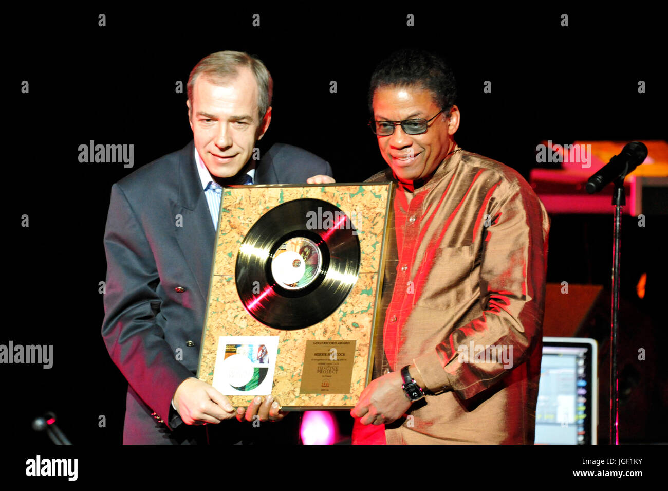 Herbie Hancock presented with Gold Record Award by Kazimierz Pułaski of