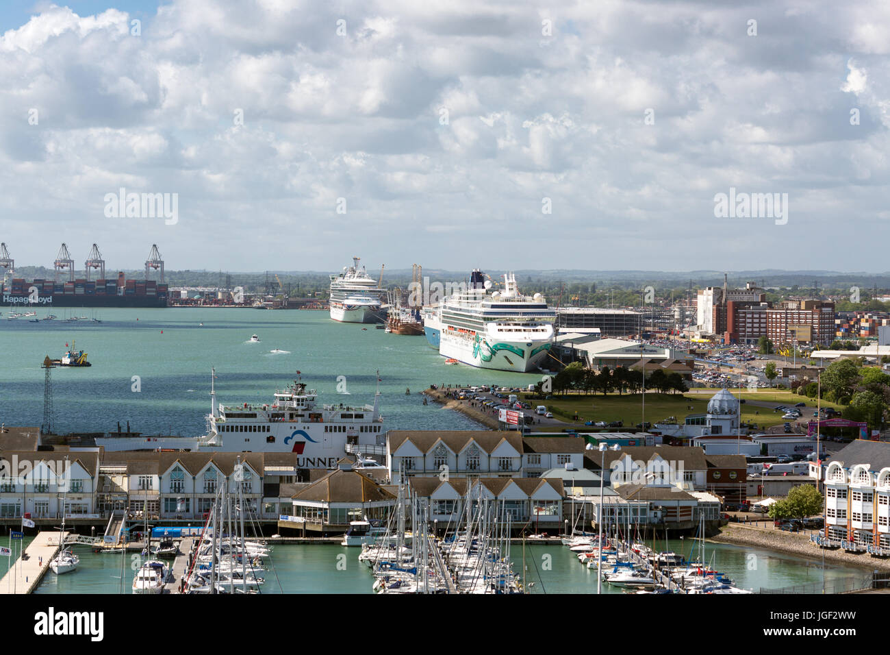 Port of Southampton looking across at a cruise ship loading passengers at the Western docks. England UK. Stock Photo