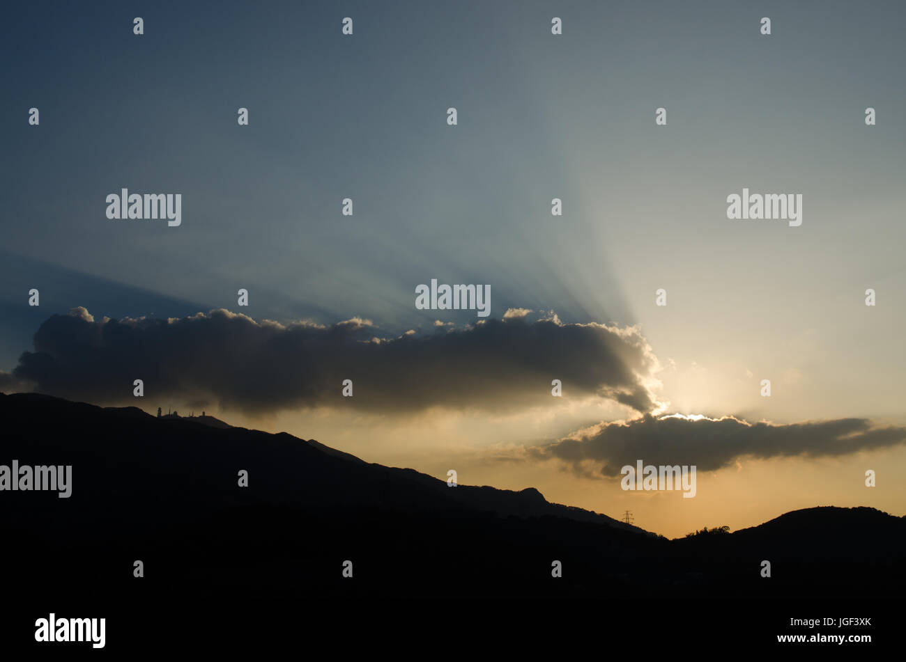 The Sunset with dramatic sky and Clouded light Stock Photo - Alamy