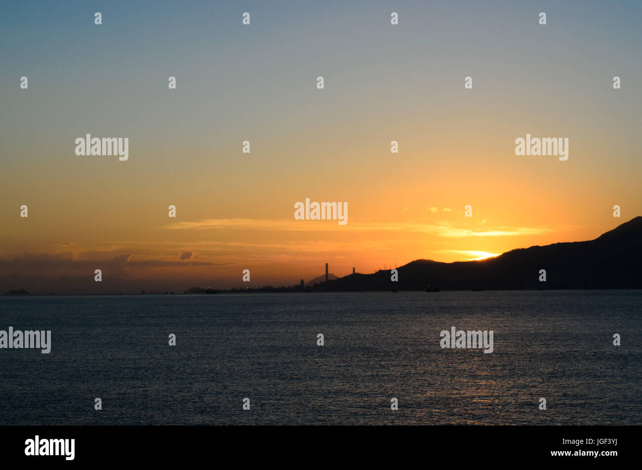 Sunset in Hong Kong Stock Photo - Alamy