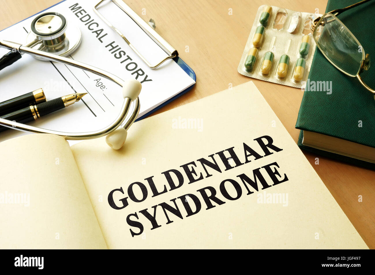 Book with title Goldenhar Syndrome on a table. Stock Photo