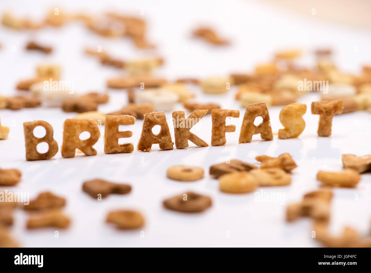 Closeup view of word breakfast and healthy breakfast cereal alphabet
