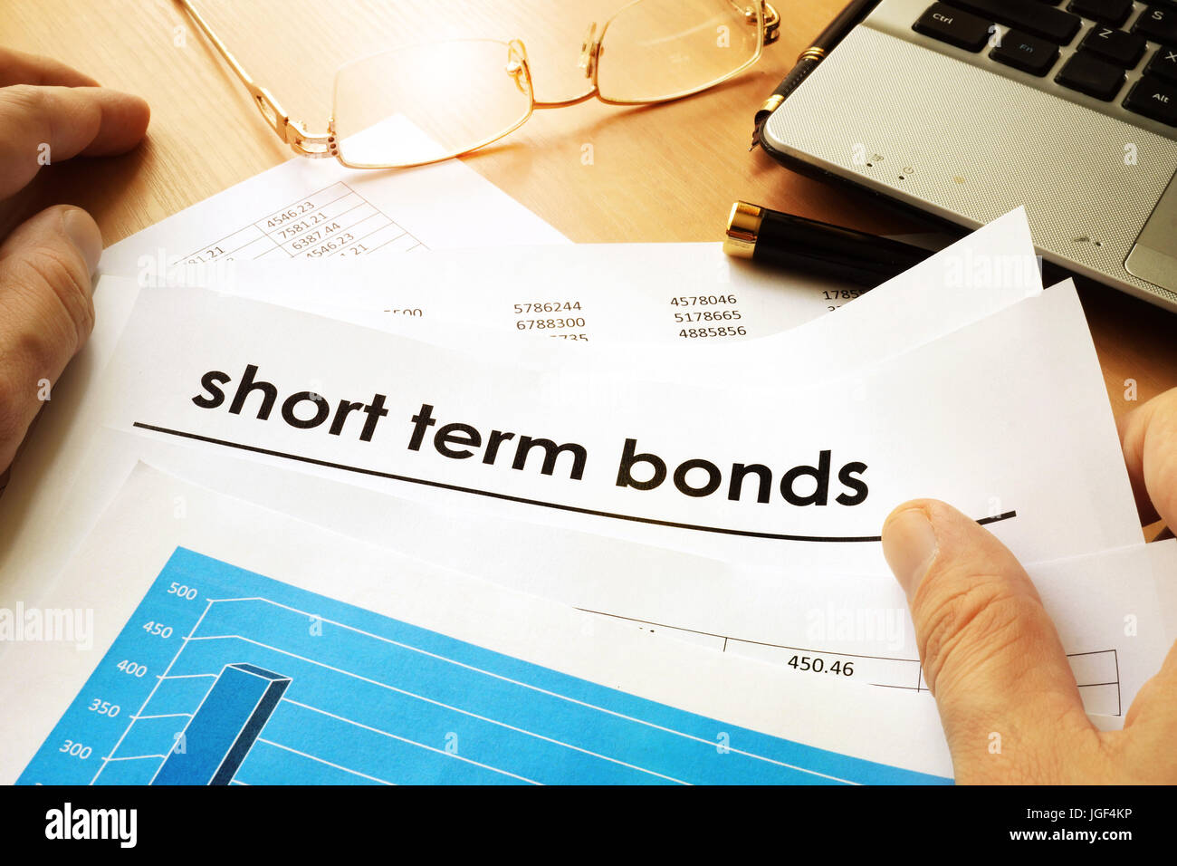 Papers with title short term bonds. Stock Photo