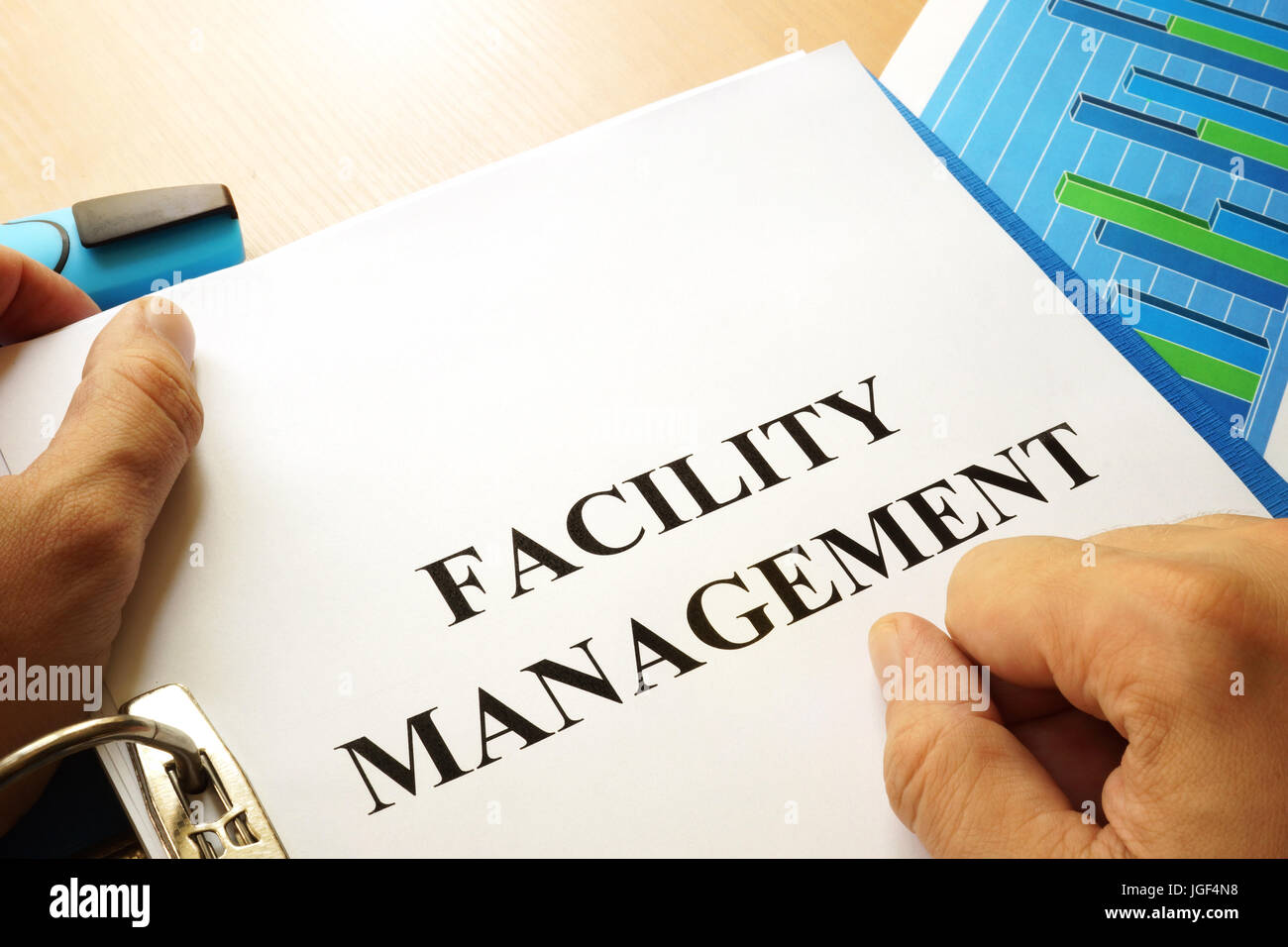 Folder with title Facility Management. Stock Photo