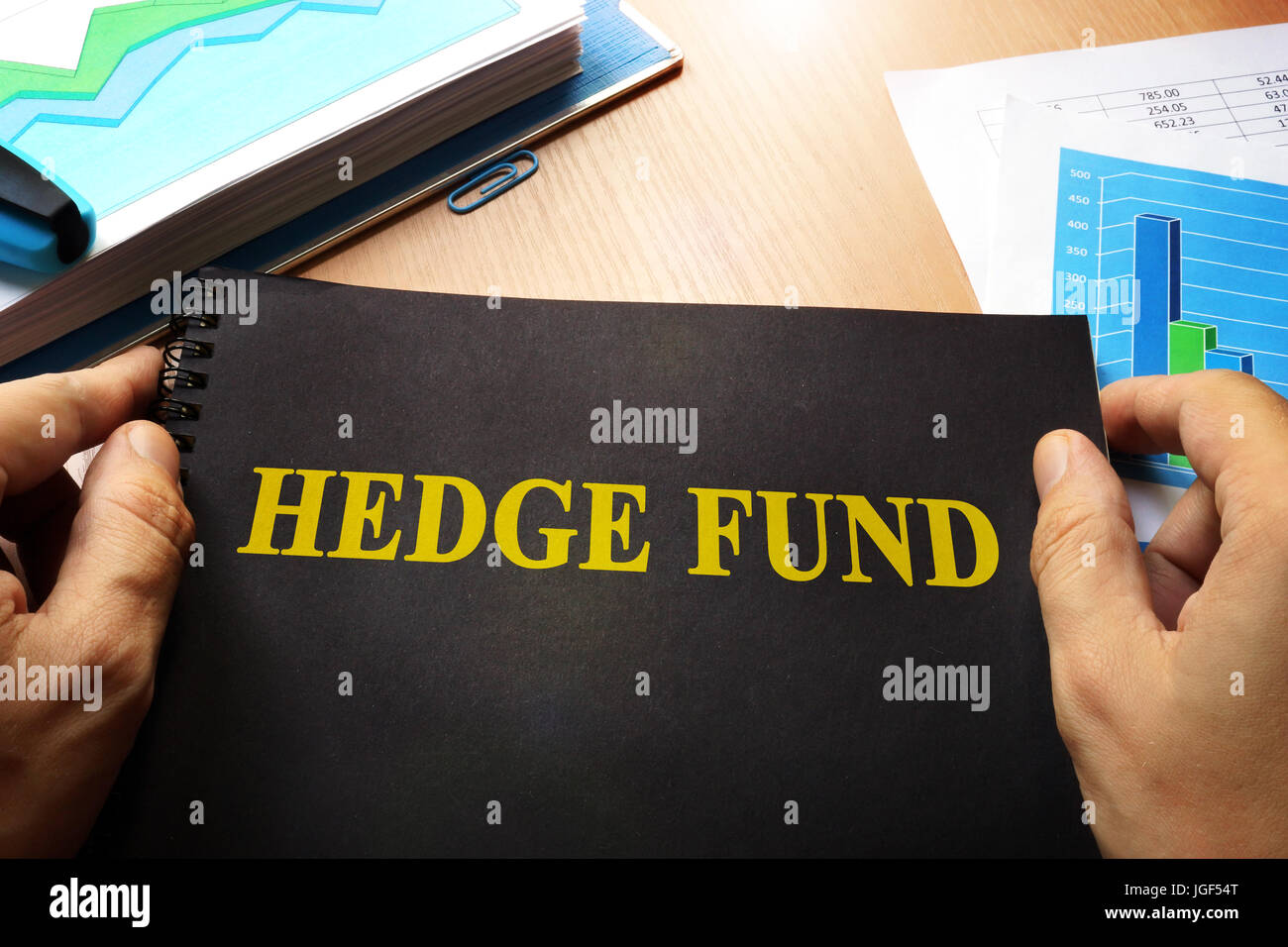 Book with name hedge fund and trading data. Stock Photo