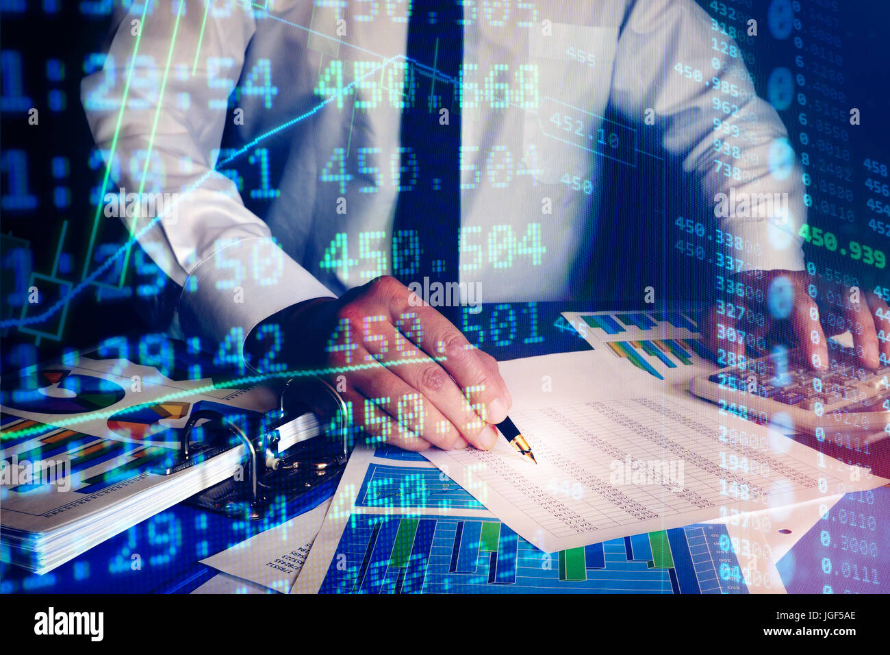Trader checking data in an office. Trading concept. Stock Photo