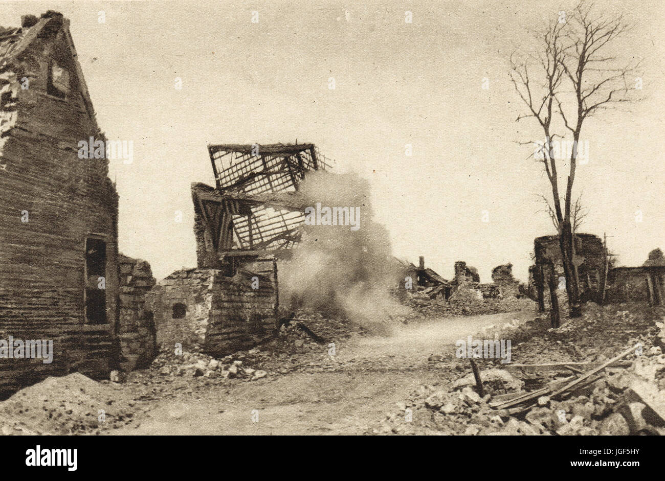 German shell exploding in French village Stock Photo