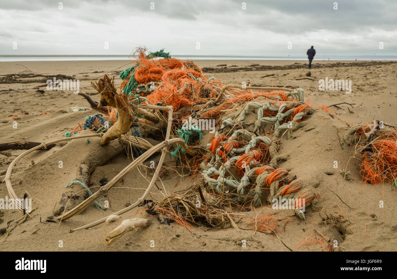 Debris and detritus left on Welsh beach following strong winds and severe weather conditions. UK. Stock Photo