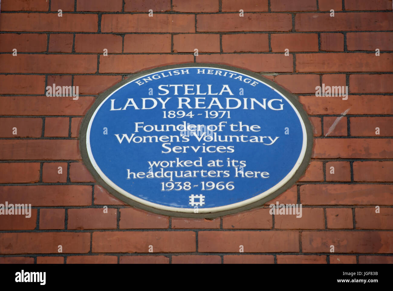 english heritage blue plaque marking a workplace of stella lady reading, founder of the women's voluntary services, london, england Stock Photo
