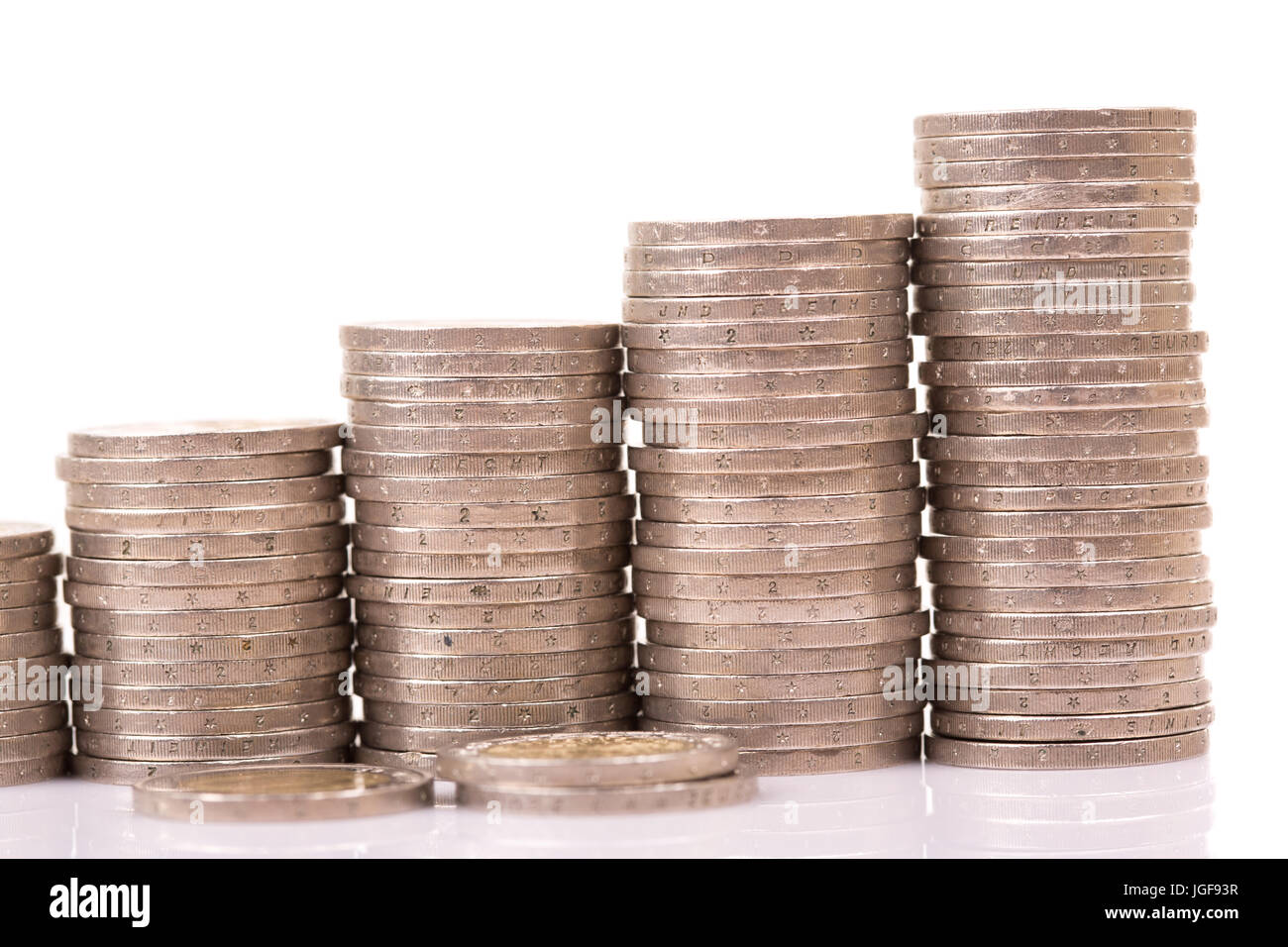 Heap of two euro coins isolated on white background Stock Photo - Alamy