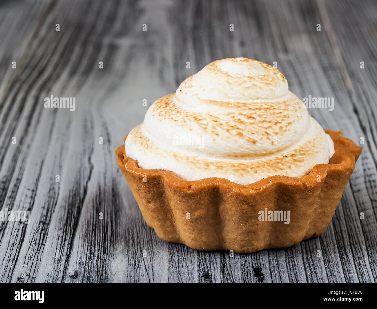 Tasty muffin cake on the wood Stock Photo