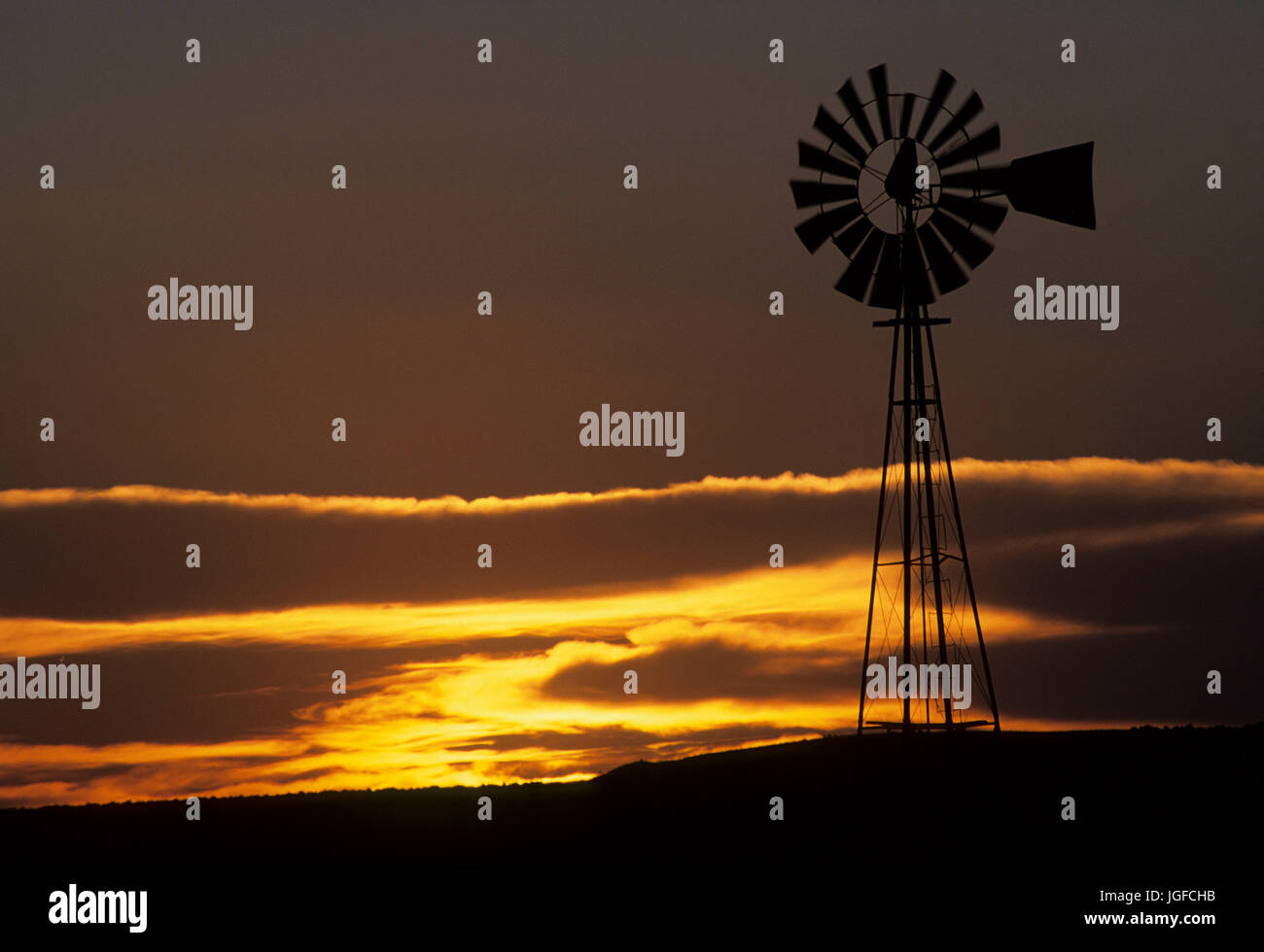 Windmill sunset, Hartley County, Texas Stock Photo Alamy