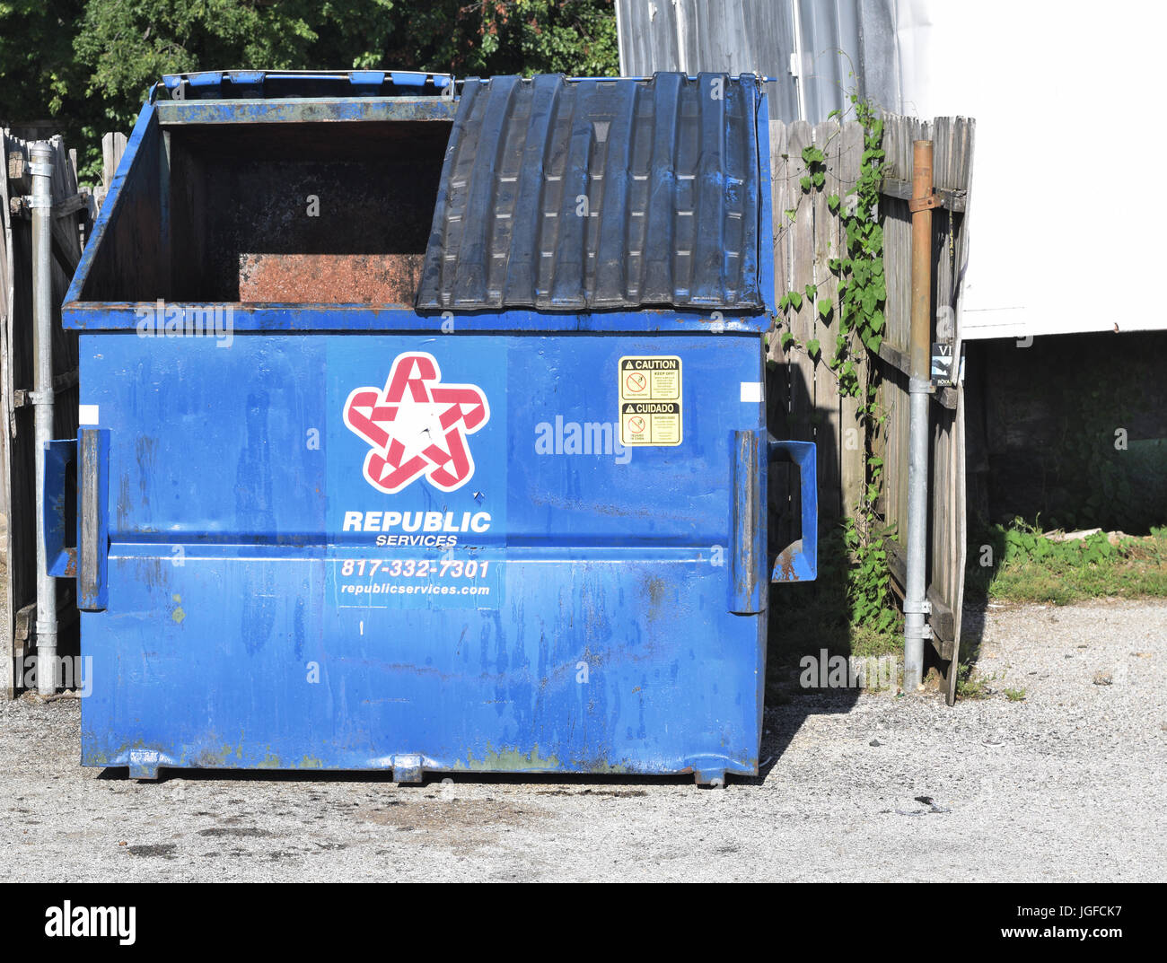 Republic Trash Services blue trash dumpsters Stock Photo