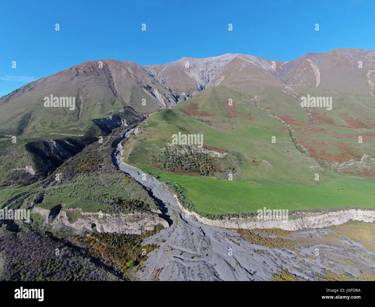 Terrible Gully and Mount Hutt Range, near Rakaia River, Canterbury, South Island, New Zealand - drone aerial Stock Photo