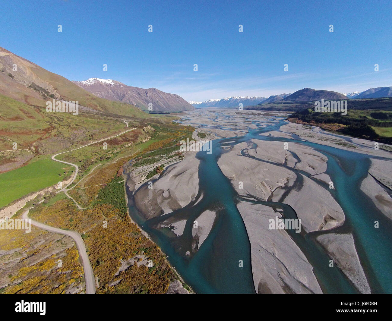 Braided streams of the Rakaia River, and Double Hill Run Road, Canterbury, South Island, New Zealand - drone aerial Stock Photo